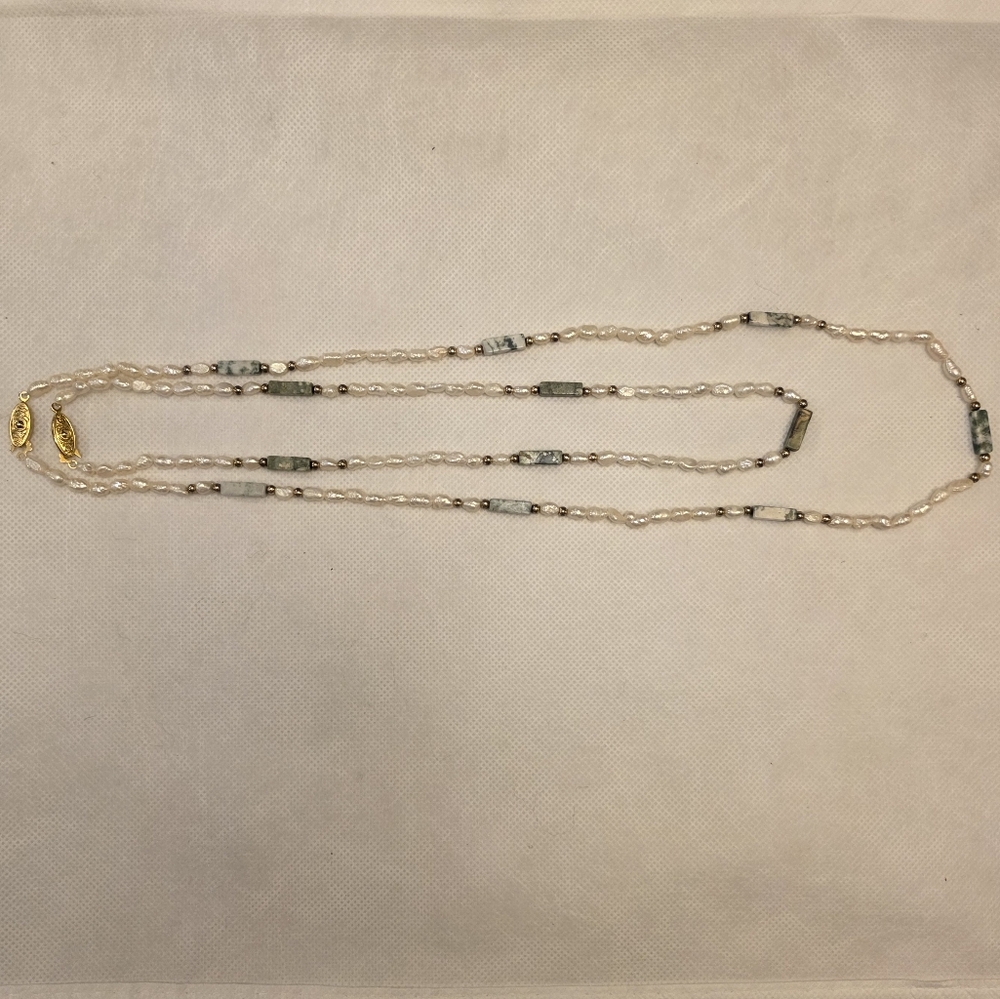 Elegant Pearl and Gold Necklace
